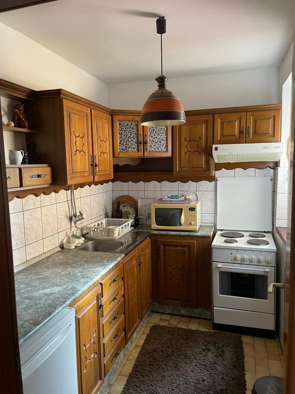 Kitchen or kitchenette, stove