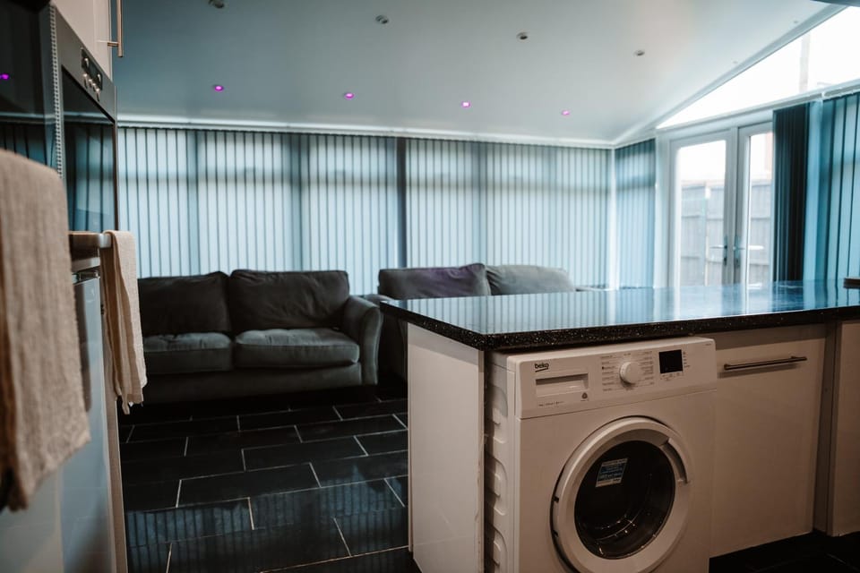 Living room, Seating area, washing machine, dryer