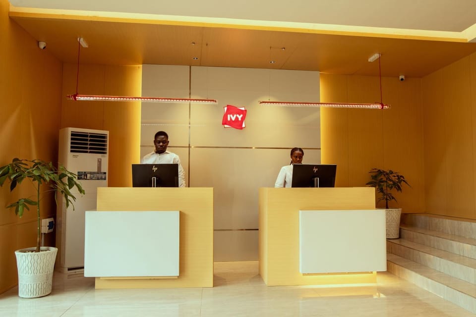 Staff, Property logo or sign, Lobby or reception