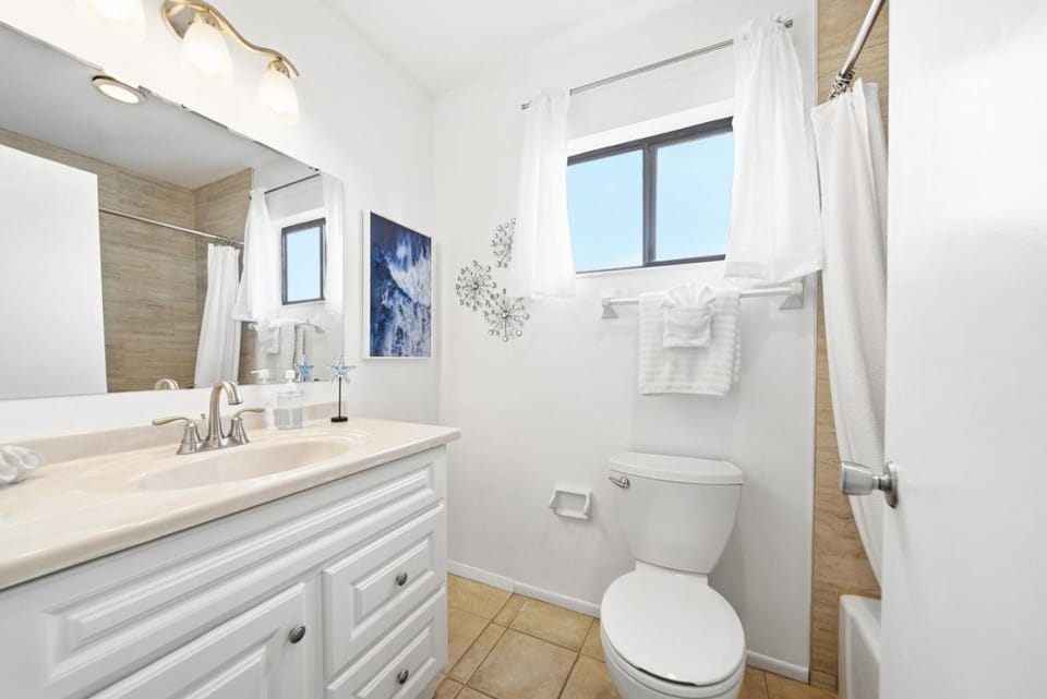 Shower, Toilet, Bathroom, Bath, flat iron, hair dryier, internet, towels, air conditioner