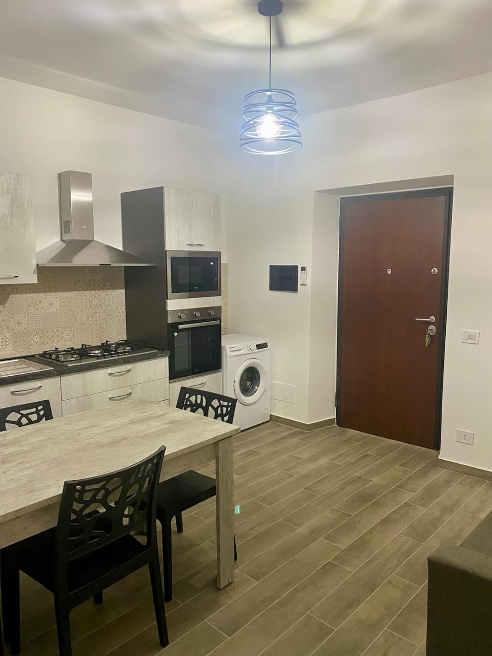 Kitchen or kitchenette, Dining area, dishwasher, microwave, oven, stove, washing machine
