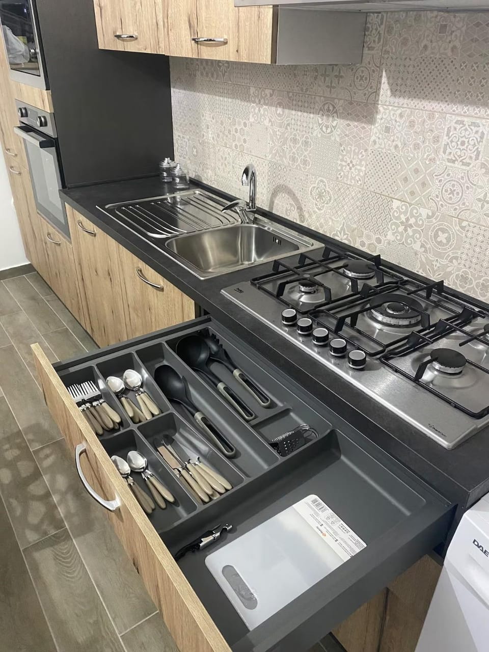 Kitchen or kitchenette, dishwasher, stove
