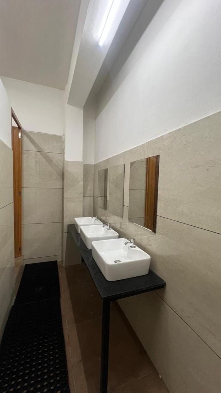 Cozy Rooms & Dormitory Hotel in Kozhikode