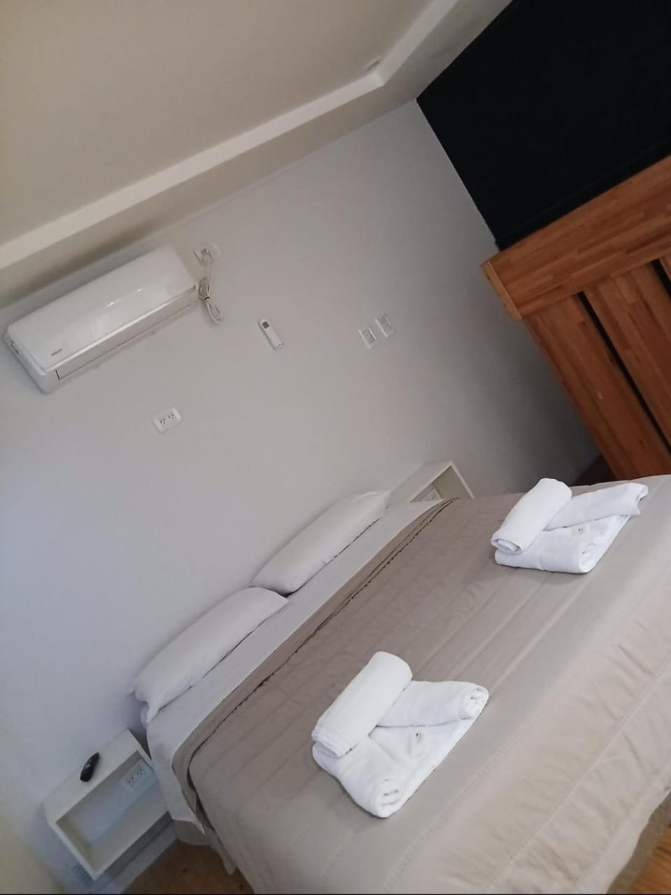 Bed, Photo of the whole room, Bedroom, towels, air conditioner