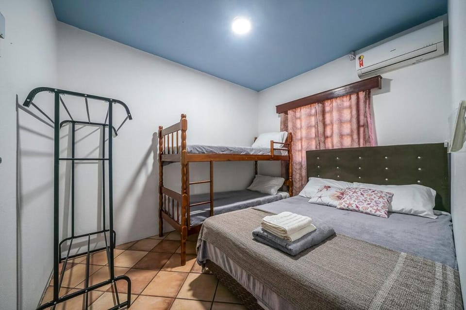 Bed, Bedroom, bunk bed, towels, air conditioner
