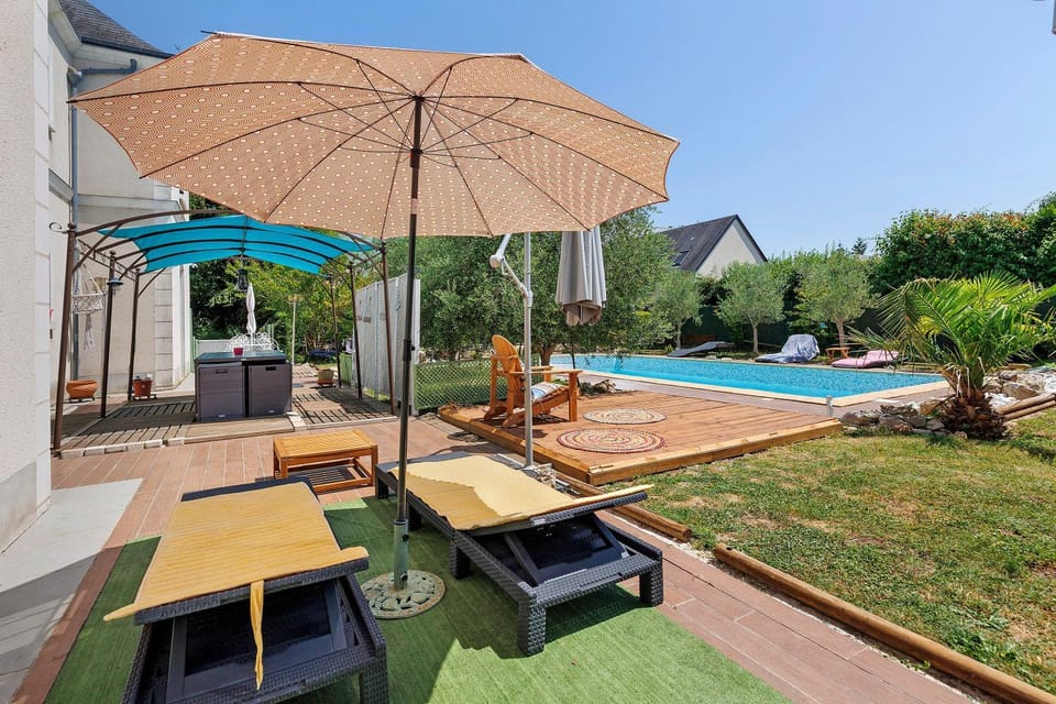 Property building, Living room, Swimming pool