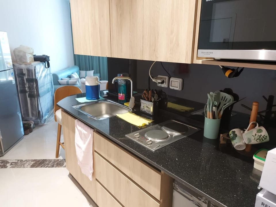 Kitchen or kitchenette, stove, toaster