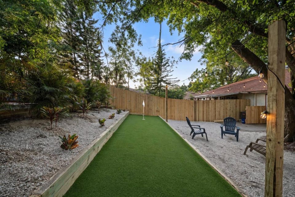 Checkmate Cottage Fire Pit + Putting Green House in Palm Harbor