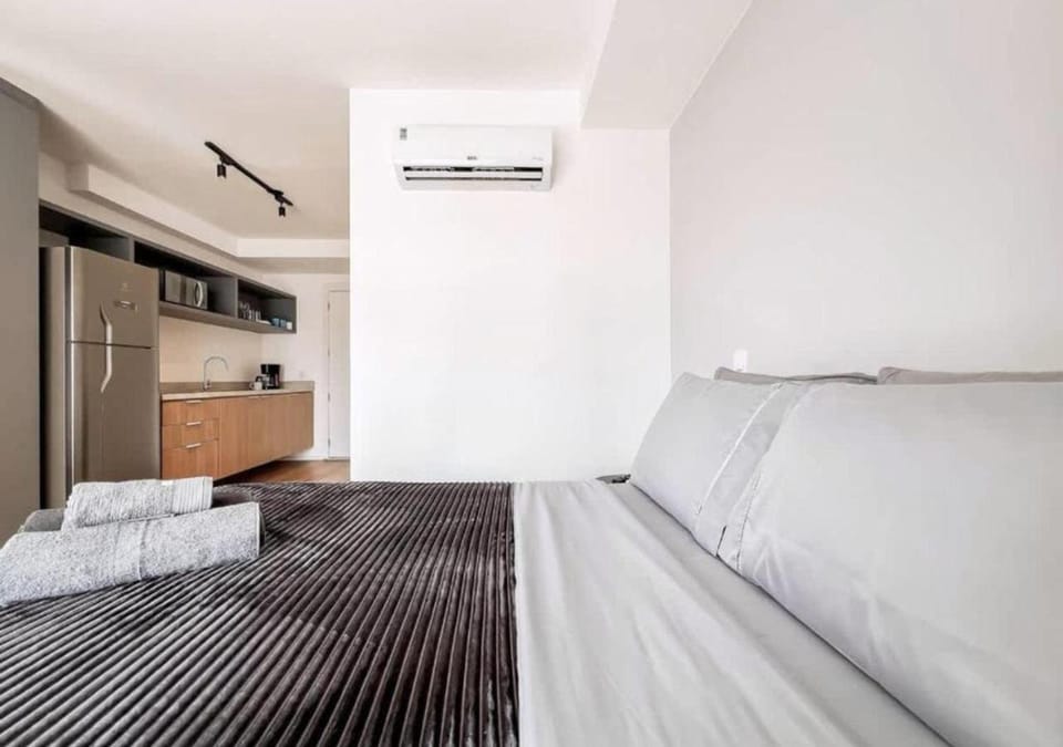 Kitchen or kitchenette, towels, air conditioner