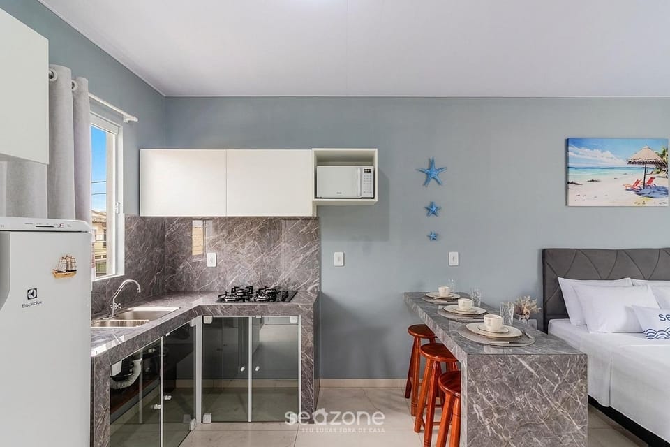 Bed, Kitchen or kitchenette, Seating area, Bedroom