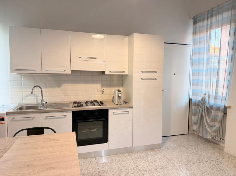 Kitchen or kitchenette, oven, stove