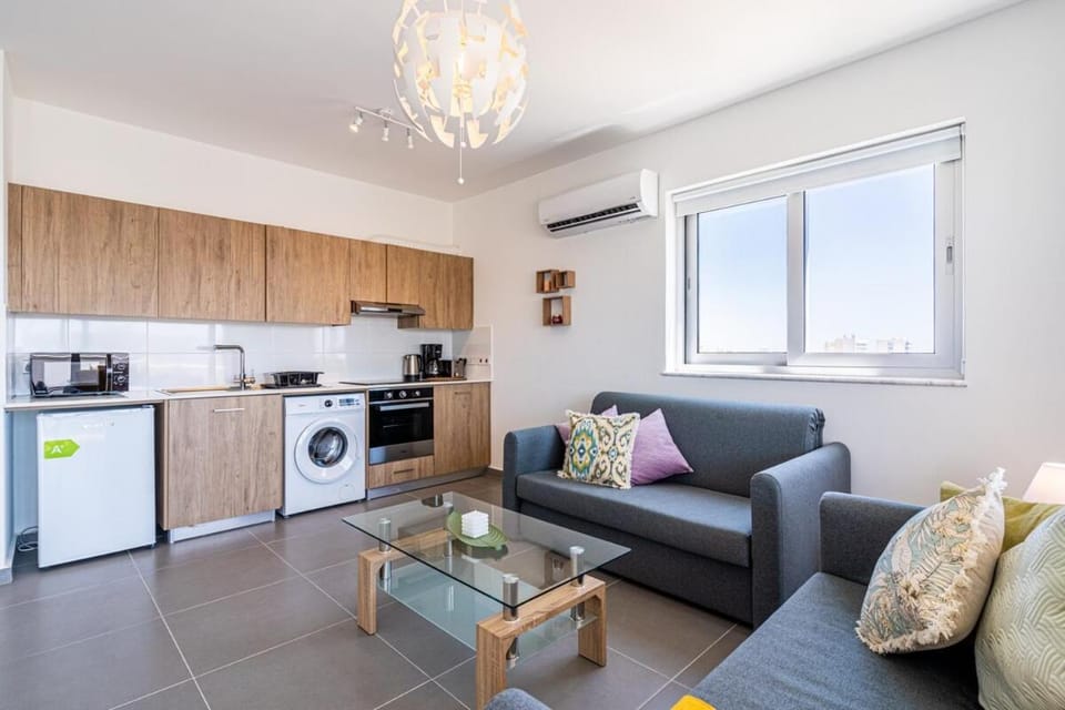 Kitchen or kitchenette, Living room, Seating area, air conditioner