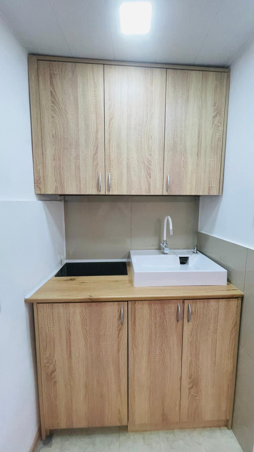 Kitchen or kitchenette, stove