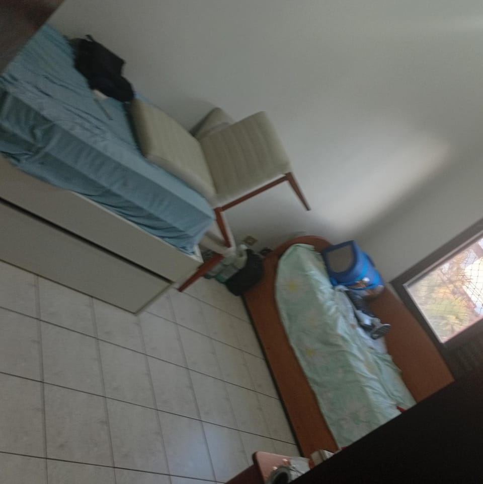 LINDO APARTAMENTO VILA CAIÇARA PRAIA GRANDE SP, 2 QUARTOS, 1 SALA, 1 COZINHA, AR CONDICIONADO EM 1 DOS QUARTOS, MAQUINA DE LAVAR ROUPA, SACADA COM REDe Apartment in State of São Paulo