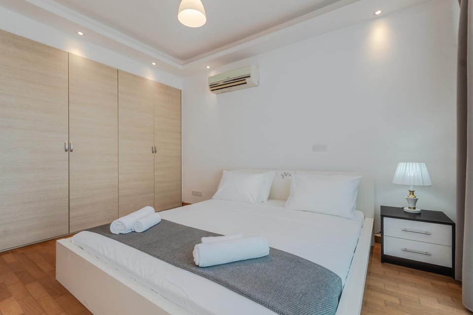 Bed, Bedroom, towels, wardrobe, air conditioner