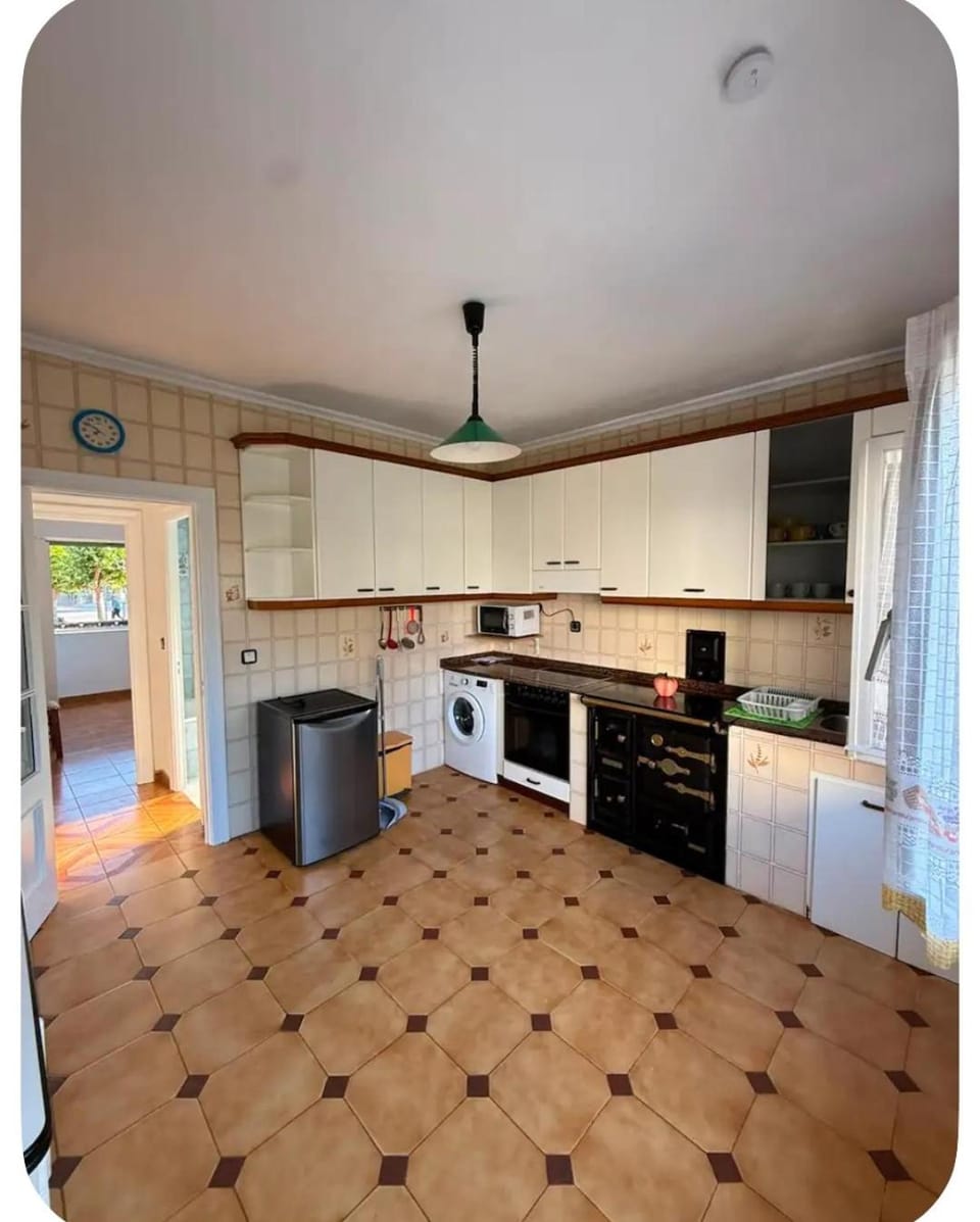 Kitchen or kitchenette, stove, toaster