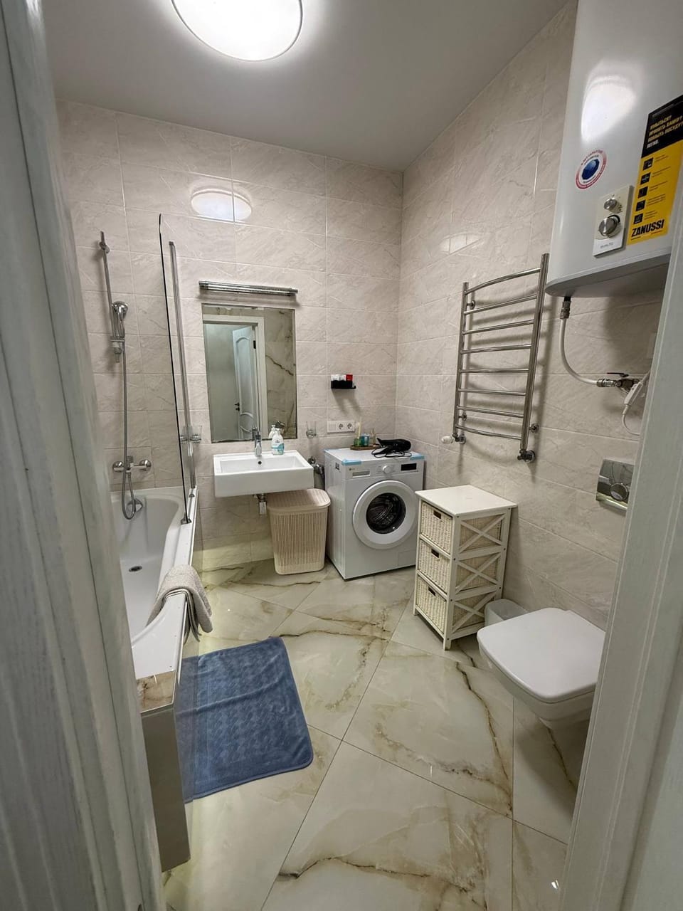 Shower, Toilet, Bathroom, towels, washing machine, dryer