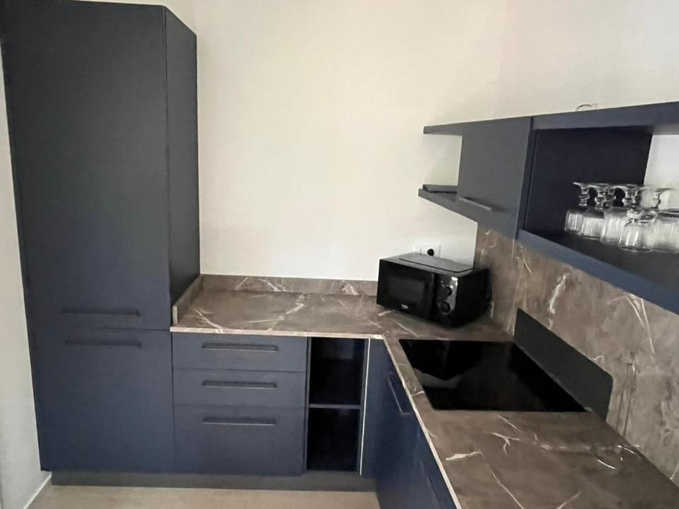 Kitchen or kitchenette, oven, stove