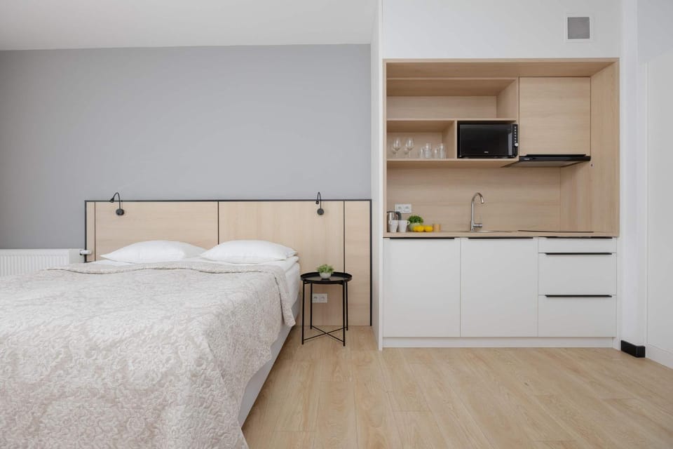 Bed, Kitchen or kitchenette, Seating area