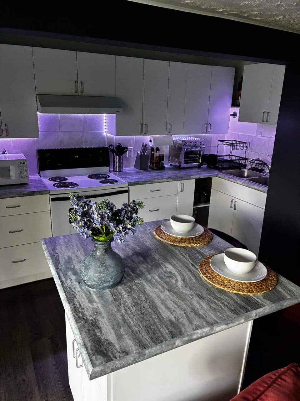 Kitchen or kitchenette, stove, toaster