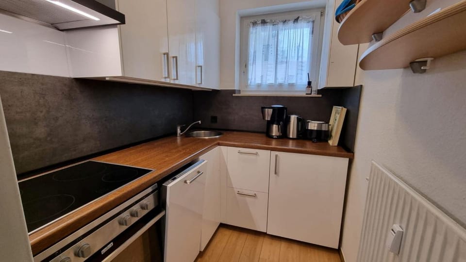 Kitchen or kitchenette, oven, stove