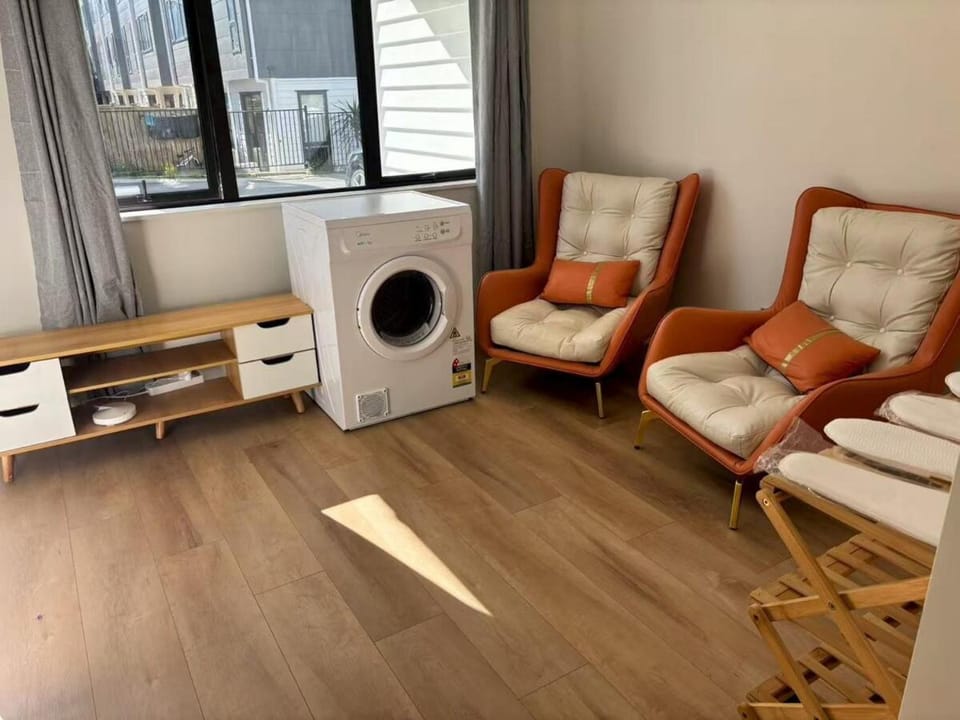 Living room, Seating area, washing machine, dryer