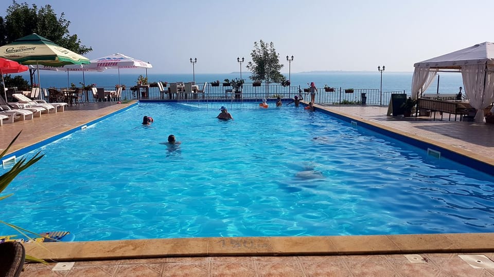 Patio, Restaurant/places to eat, Lounge or bar, Pool view, Sea view, Swimming pool