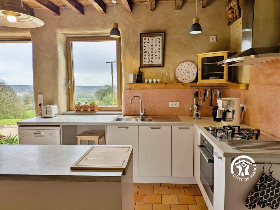 Kitchen or kitchenette, dishwasher, oven, stove, toaster