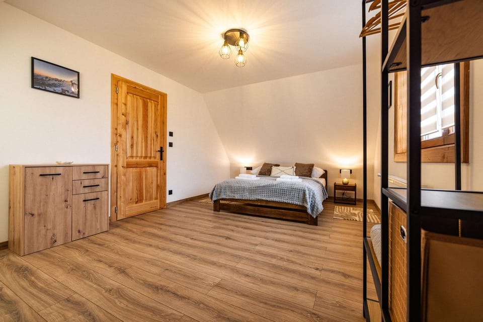 Bed, towels, wardrobe