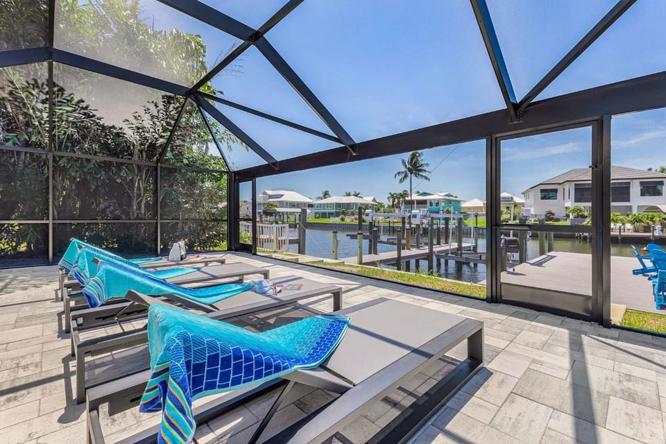 Modern Waterfront Retreat with Pool, Spa & Canal Access - FMB - Sea-O-Siesta - Roelens House in Lee County