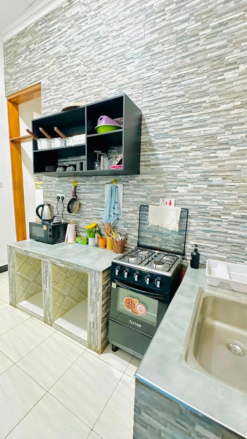 Kitchen or kitchenette, stove
