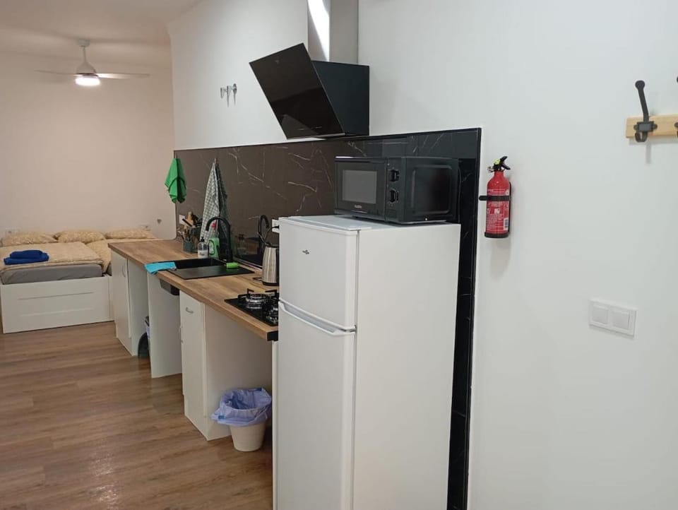 Kitchen or kitchenette, stove