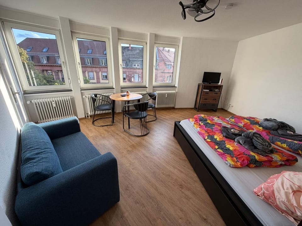 Bed, Living room, Photo of the whole room, Seating area, Bedroom