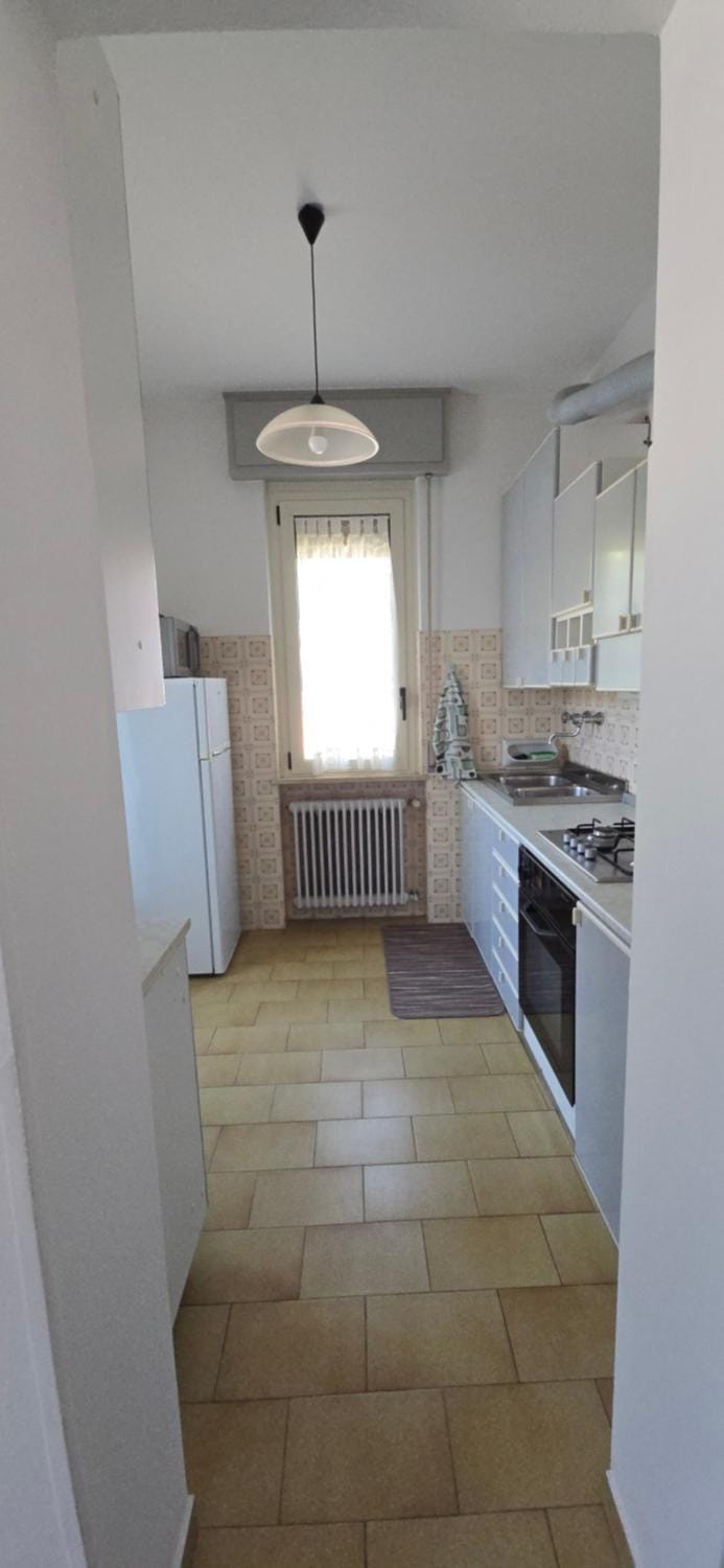 Kitchen or kitchenette, oven, stove