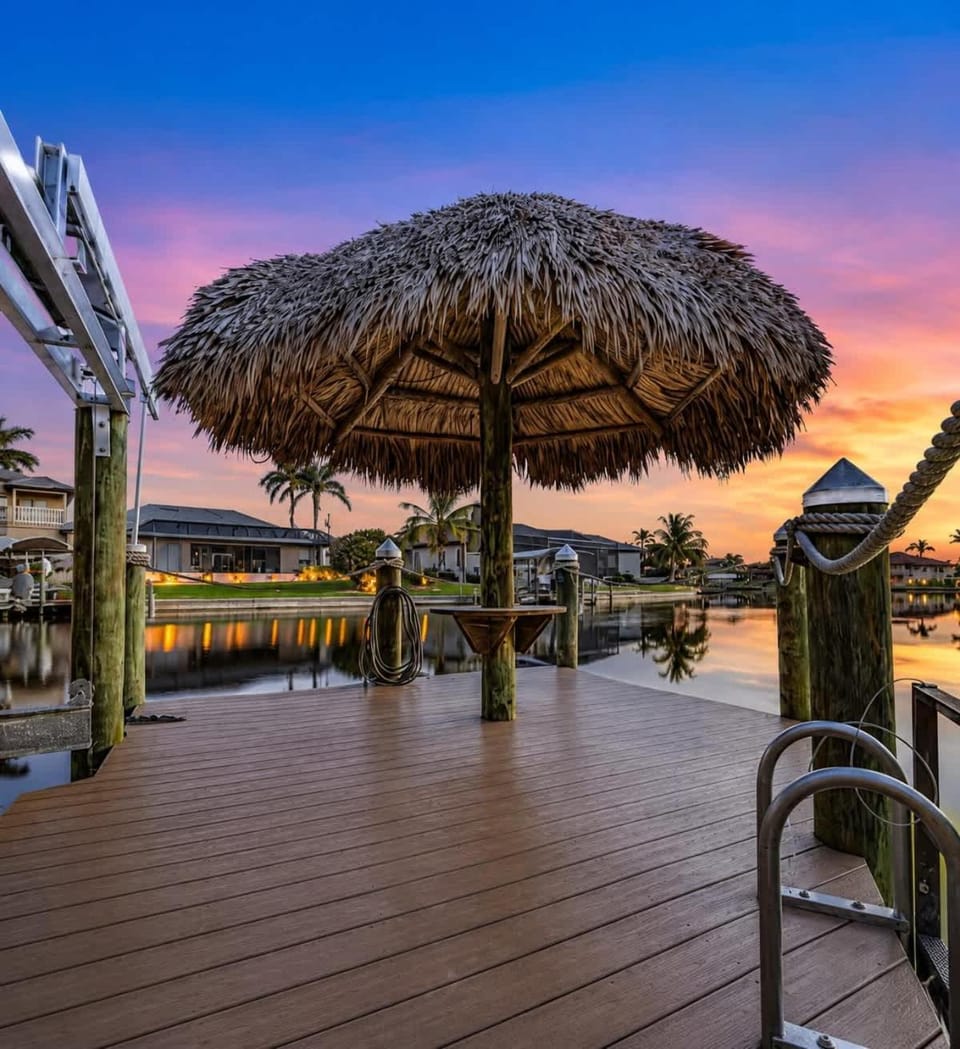 THE Luxury Villa Gulf Access Pool Spa Tiki Hut House in Cape Coral