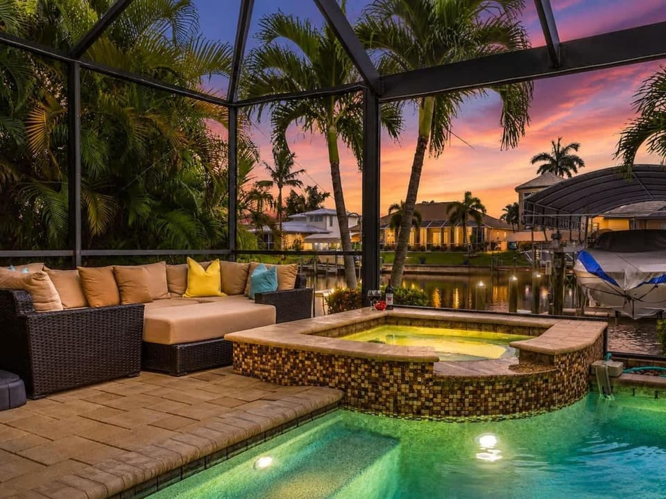 THE Luxury Villa Gulf Access Pool Spa Tiki Hut House in Cape Coral