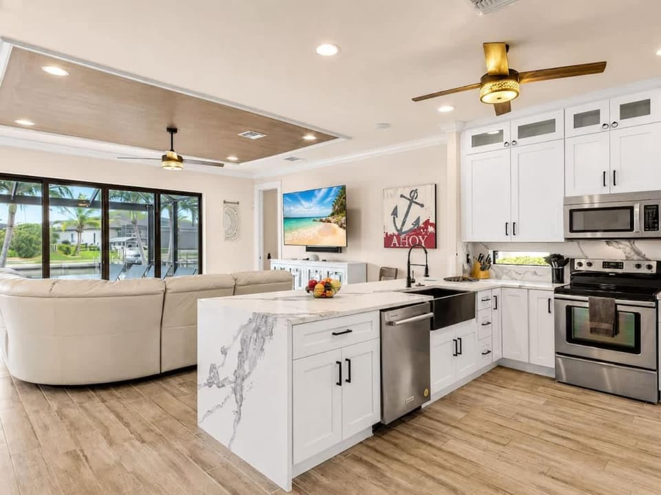 THE Luxury Villa Gulf Access Pool Spa Tiki Hut House in Cape Coral