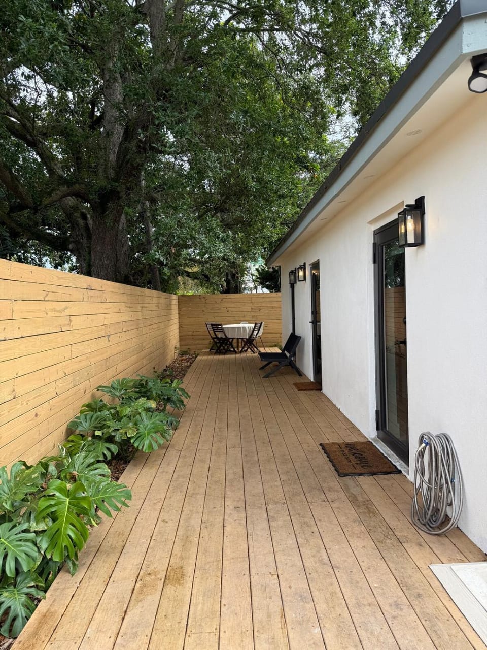 Private gated Miami home with oak tree deck House in Miami