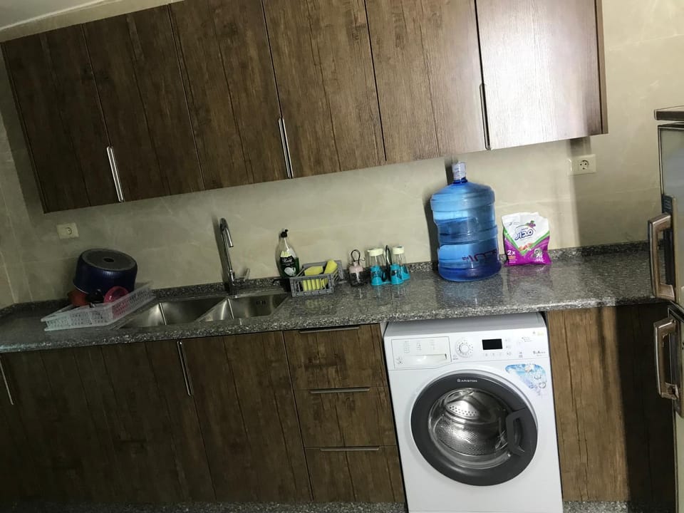 Kitchen or kitchenette, washing machine