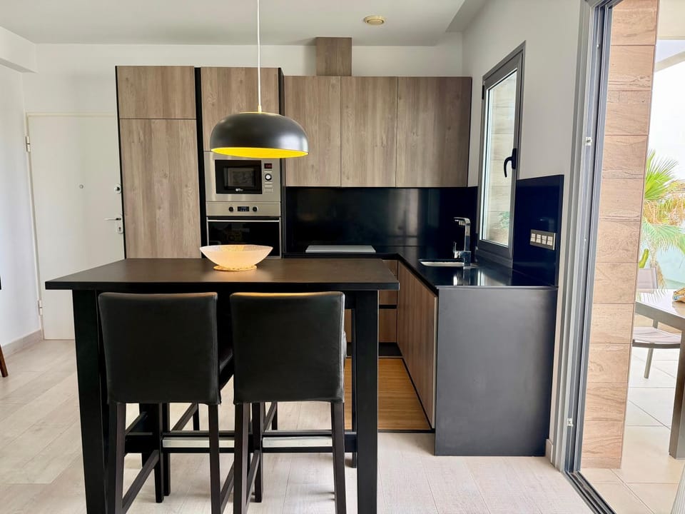Kitchen or kitchenette, oven, stove
