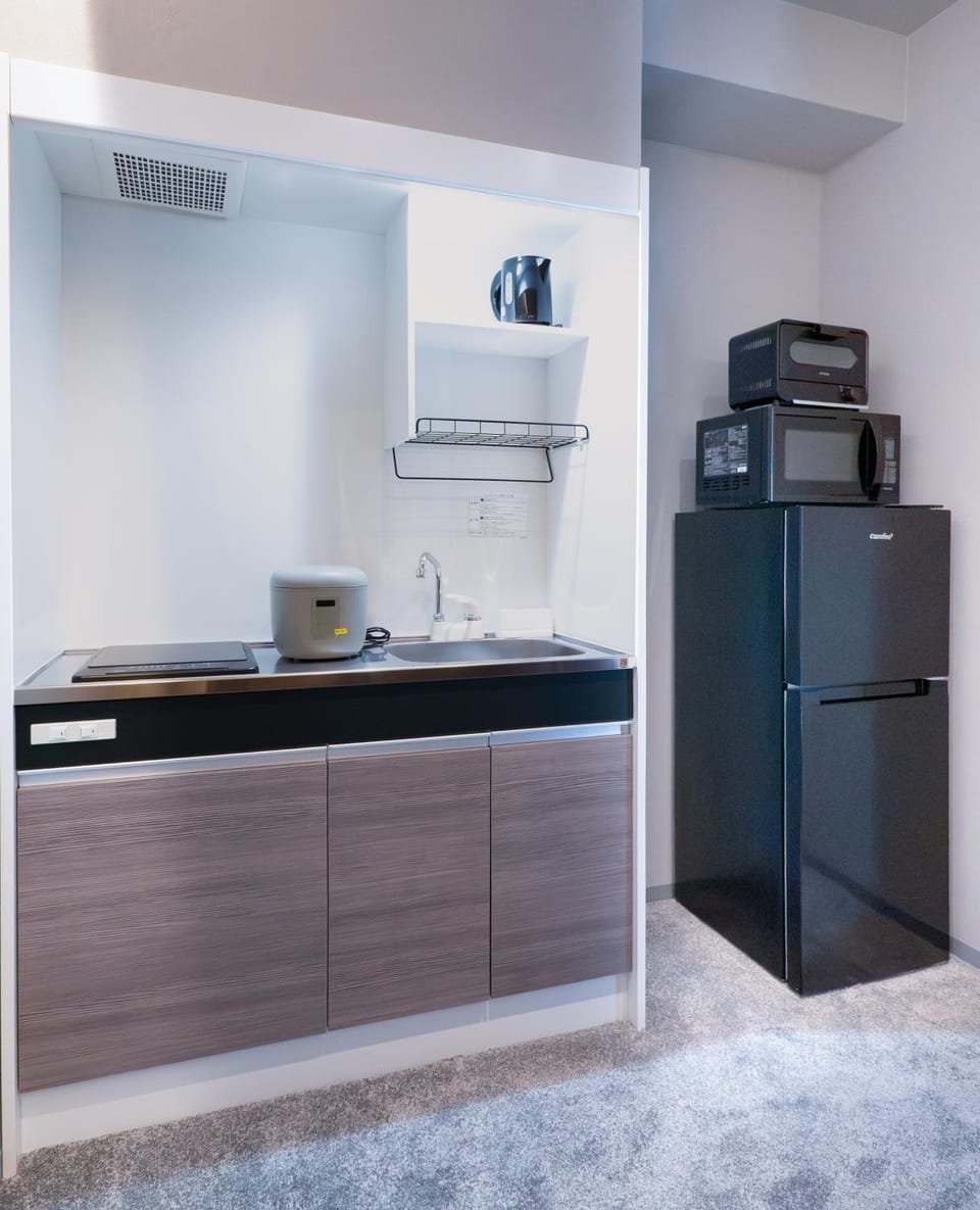Kitchen or kitchenette, stove