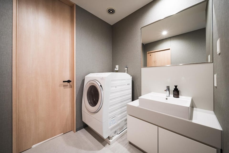 Bathroom, washing machine, dryer