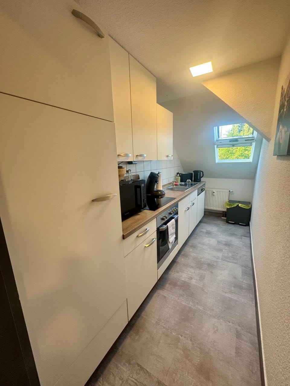 Kitchen or kitchenette, oven, stove