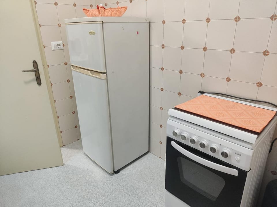Kitchen or kitchenette, oven, stove