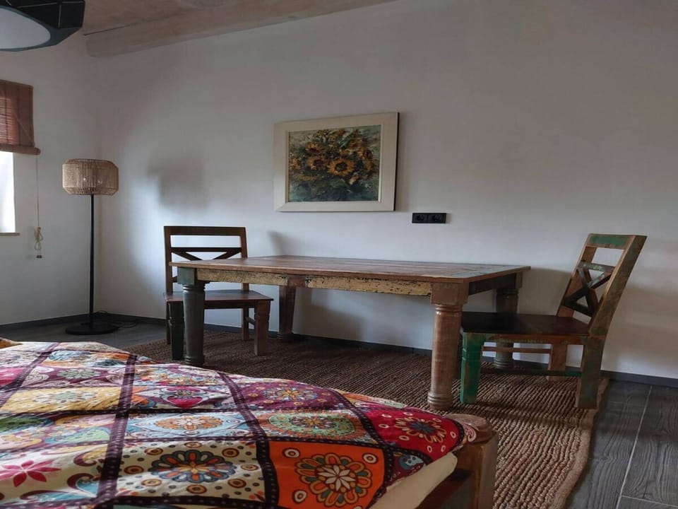 Photo of the whole room, Seating area, Dining area