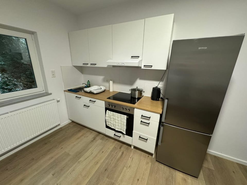 Kitchen or kitchenette, oven, stove, toaster