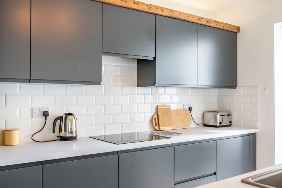 Kitchen or kitchenette, stove, toaster