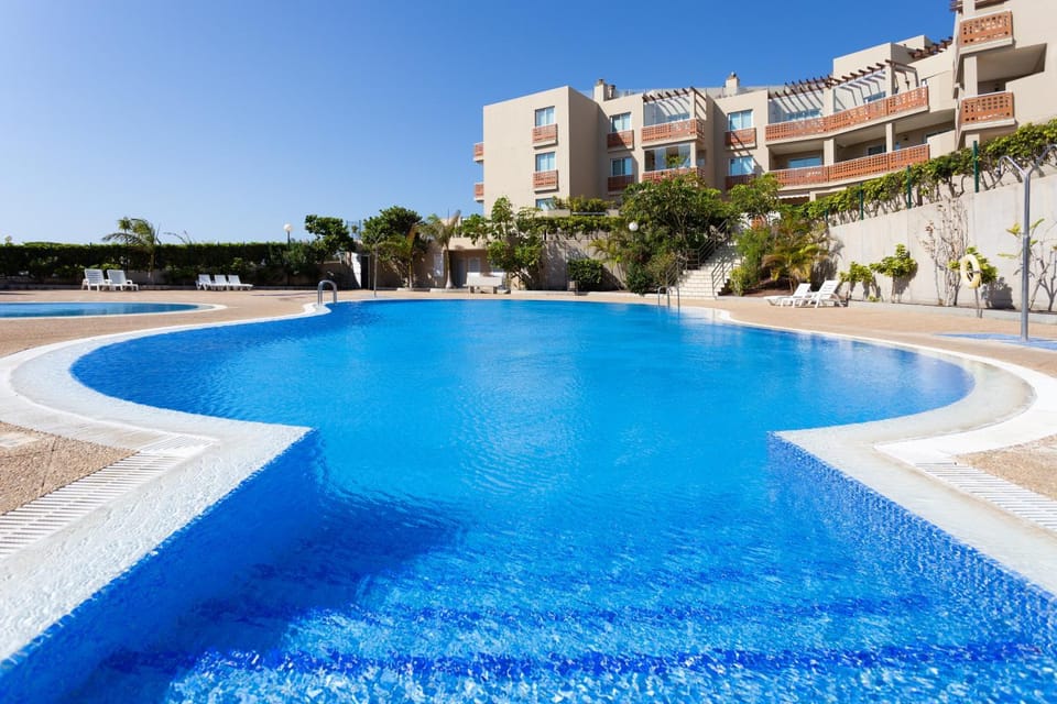 Property building, Living room, Swimming pool