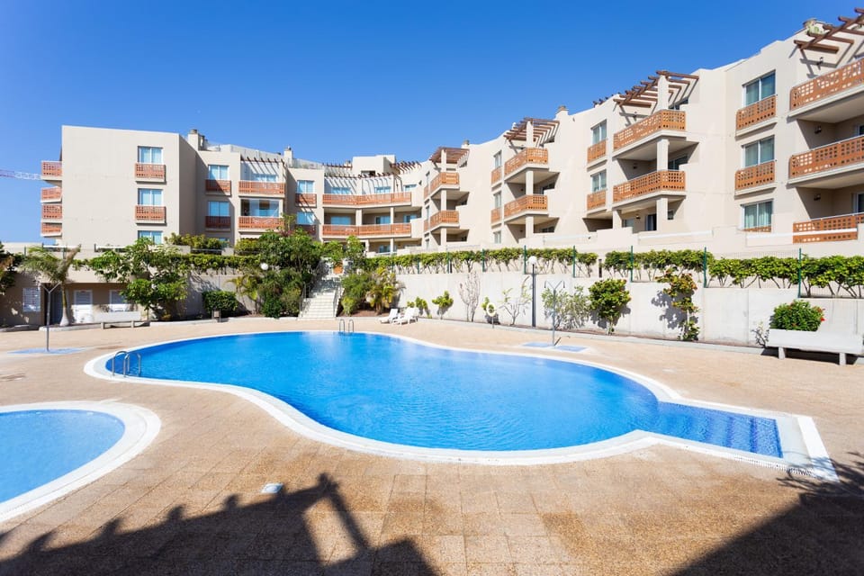 Property building, Living room, Swimming pool