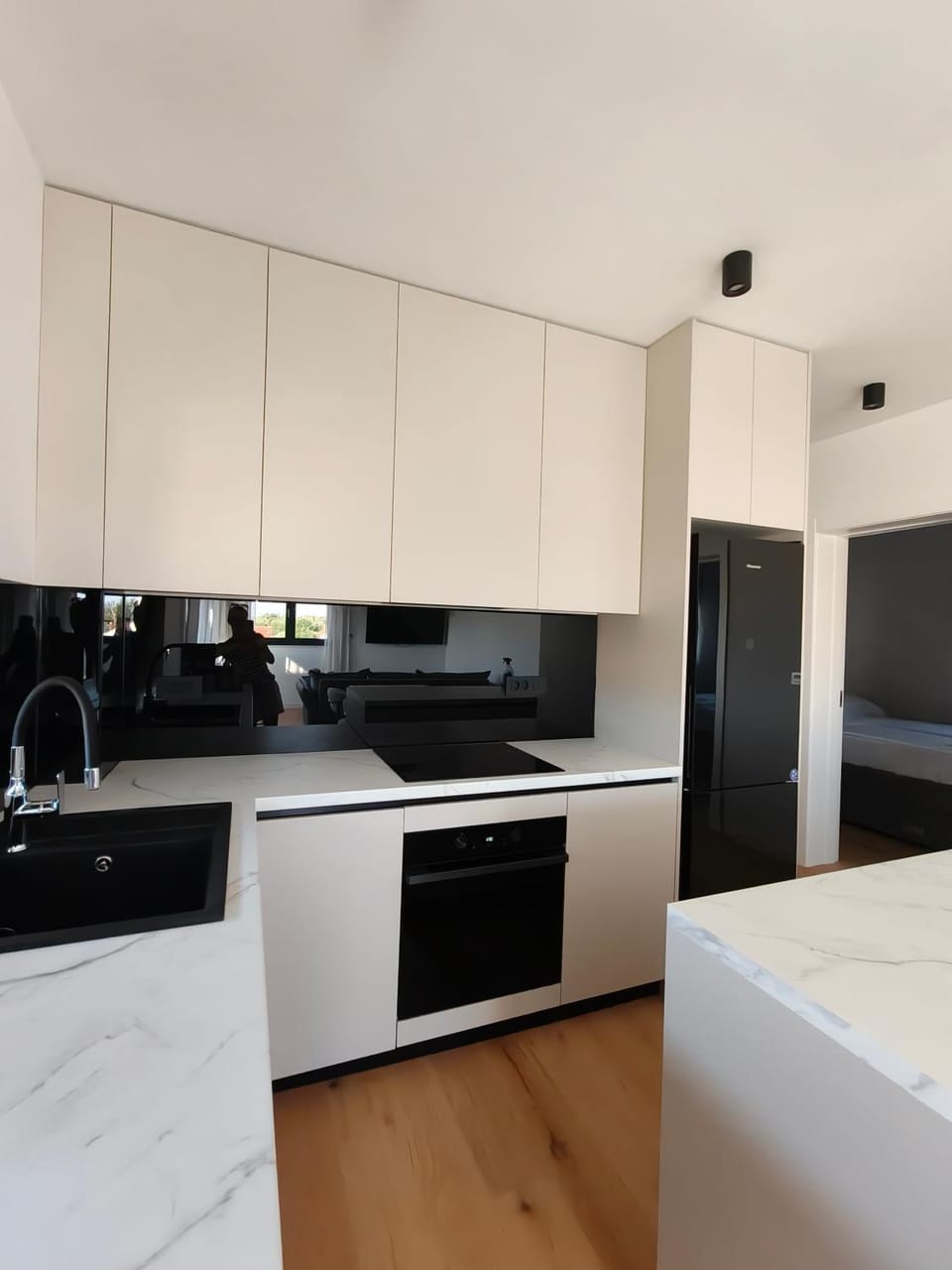 Kitchen or kitchenette, dishwasher, oven, stove